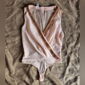 Bebe pale pink bodysuit